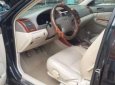 Toyota Camry 2003 - Bán xe Toyota Camry 2003, màu đen, số sàn, giá chỉ 295 triệu