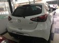 Mazda 2 2016 - Cần bán gấp Mazda 2 sản xuất 2016, màu trắng chính chủ