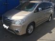 Toyota Innova 2.0E 2014 - Cần bán Toyota Innova 2.0E đời 2014, màu bạc số sàn