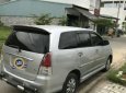 Toyota Innova 2010 - Cần bán xe Toyota Innova đời 2010, màu bạc xe gia đình