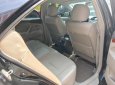 Toyota Camry 2.4G 2010 - Bán Toyota Camry 2.4G sản xuất năm 2010, màu đen