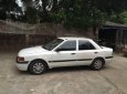 Mazda 323    1994 - Bán xe Mazda 323 sản xuất năm 1994, màu trắng, xe nhập