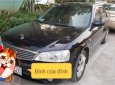 Ford Laser GHIA 1.8 AT 2004 - Bán ô tô Ford Laser GHIA 1.8 AT sản xuất năm 2004, màu đen