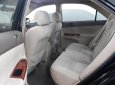 Toyota Camry 2.4G 2005 - Bán Toyota Camry 2.4G 2005, màu đen chính chủ, giá chỉ 395 triệu