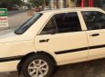 Mazda 323 1.6 MT 1995 - Bán ô tô Mazda 323 1.6 MT đời 1995, màu trắng