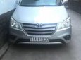 Toyota Innova 2.0 E  2014 - Bán Toyota Innova 2.0 E đời 2014, màu bạc  