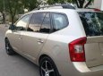 Kia Carens   2.0 2010 - Bán Kia Carens 2.0 năm 2010, màu vàng cát