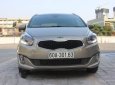 Kia Rondo   2.0 GAT  2016 - Bán xe Kia Rondo 2.0 GAT đời 2016, màu vàng  