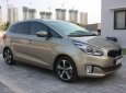 Kia Rondo   2.0 GAT  2016 - Bán xe Kia Rondo 2.0 GAT đời 2016, màu vàng  