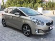 Kia Rondo   2.0 GAT 2016 - Bán Kia Rondo 2.0 GAT đời 2016, màu vàng cát