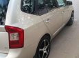 Kia Carens   2.0 2010 - Bán Kia Carens 2.0 năm 2010, màu vàng cát