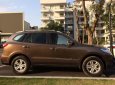 Hyundai Santa Fe 2011 - Cần bán gấp Hyundai Santa Fe năm sản xuất 2011, màu nâu, nhập khẩu