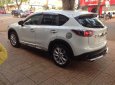 Mazda CX 5 2014 - Cần bán lại xe Mazda CX 5 2014, màu trắng còn mới, 740tr