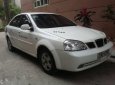 Daewoo Lacetti  EX 1.6 2004 - Bán xe Daewoo Lacetti EX 1.6 đời 2004, màu trắng xe gia đình, giá 145tr