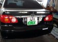 Toyota Corolla altis 2003 - Cần bán lại xe Toyota Corolla altis 2003, màu đen xe gia đình, giá chỉ 250 triệu