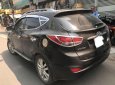 Hyundai Tucson 2011 - Bán Hyundai Tucson 2011, màu đen, biển TP, giá thương lượng, hổ trợ góp