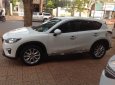 Mazda CX 5 2014 - Cần bán lại xe Mazda CX 5 2014, màu trắng còn mới, 740tr