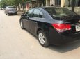 Chevrolet Cruze   2011 - Bán xe Chevrolet Cruze sản xuất 2011, màu đen chính chủ, 315tr