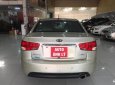 Kia Forte 1.6MT 2011 - Bán Kia Forte 1.6MT 2011, màu kem