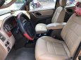 Ford Escape 3.0 V6 2003 - Cần bán xe Ford Escape AT đời 2003, màu vàng, nhập khẩu nguyên chiếc số tự động