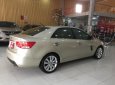 Kia Forte 1.6MT 2011 - Bán Kia Forte 1.6MT 2011, màu kem