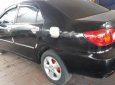 Toyota Corolla altis 2003 - Cần bán lại xe Toyota Corolla altis 2003, màu đen xe gia đình, giá chỉ 250 triệu