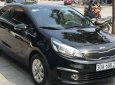 Kia Rio  1.4 AT  2015 - Cần bán lại xe Kia Rio 1.4 AT sản xuất năm 2015, màu đen số tự động, 495tr