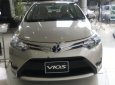 Toyota Vios 1.5E 2018 - Bán ô tô Toyota Vios 1.5E đời 2018, màu vàng cát