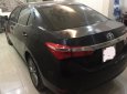 Toyota Corolla altis 1.8G 2015 - Bán ô tô Toyota Corolla altis 1.8G đời 2015, màu đen, 675tr