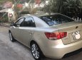 Kia Forte 1.6MT 2010 - Cần bán gấp Kia Forte 1.6MT sản xuất năm 2010, màu kem (be)