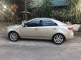 Kia Forte 1.6MT 2010 - Cần bán gấp Kia Forte 1.6MT sản xuất năm 2010, màu kem (be)