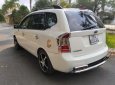 Kia Carens LX 1.6 MT 2010 - Bán Kia Carens LX 1.6 MT sản xuất 2010, màu trắng