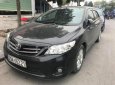 Toyota Corolla altis 1.8G MT 2010 - Bán ô tô Toyota Corolla altis 1.8G MT 2010, màu đen số sàn