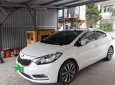 Kia K3 1.6 AT 2014 - Bán Kia K3 1.6 AT đời 2014, màu trắng số tự động