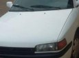 Mazda 323 1996 - Cần bán gấp Mazda 323 năm 1996, màu trắng, nhập khẩu, xe gia đình
