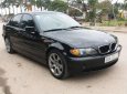 BMW 3 Series  318i  2002 - Bán xe BMW 3 Series 318i sản xuất 2002, màu đen  