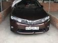 Toyota Corolla altis 1.8G MT 2014 - Bán ô tô Toyota Corolla Altis 1.8G MT năm 2014, màu nâu