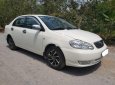 Toyota Corolla altis 1.3 MT 2003 - Bán Toyota Corolla Altis đời 2003, màu trắng xe gia đình, giá 238tr