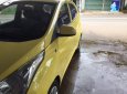 Hyundai Eon   2012 - Bán lại xe Hyundai Eon đời 2012, màu vàng