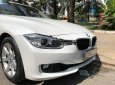 BMW 3 Series 328i 2012 - Cần bán BMW 3 Series 328i đời 2012, màu trắng, xe nhập