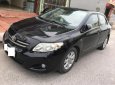 Toyota Corolla altis 1.8G MT 2009 - Bán Toyota Corolla altis 1.8G MT đời 2009, màu đen chính chủ giá cạnh tranh