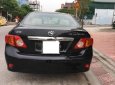 Toyota Corolla altis 1.8G MT 2009 - Bán Toyota Corolla altis 1.8G MT đời 2009, màu đen chính chủ giá cạnh tranh