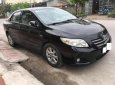 Toyota Corolla altis 1.8G MT 2009 - Bán Toyota Corolla altis 1.8G MT đời 2009, màu đen chính chủ giá cạnh tranh