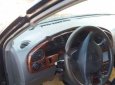 Kia Spectra 1.6 MT 2003 - Cần bán Kia Spectra 1.6 MT đời 2003, màu đen, giá 128tr