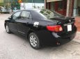 Toyota Corolla altis 1.8G MT 2009 - Bán Toyota Corolla altis 1.8G MT đời 2009, màu đen chính chủ giá cạnh tranh