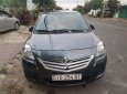 Toyota Vios 1.5 MT 2009 - Cần bán gấp Toyota Vios sản xuất năm 2009, màu xám xe gia đình