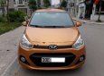 Hyundai Premio 1.0AT 2014 - Cần bán lại xe Hyundai Grand i10 1.0AT đời 2014, xe nhập như mới