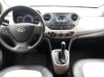 Hyundai Premio 1.0AT 2014 - Cần bán lại xe Hyundai Grand i10 1.0AT đời 2014, xe nhập như mới