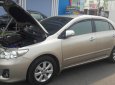 Toyota Corolla altis G 2014 - Bán Toyota Corolla altis G năm sản xuất 2014, màu vàng chính chủ giá cạnh tranh