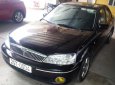 Ford Laser GHIA 2003 - Cần bán xe Ford Laser GHIA sản xuất năm 2003, màu đen, 215 triệu